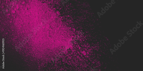 Pink powder explosion on black background. Abstract Pink and Black Spray Paint Texture Background. Colored cloud. Colorful dust explode. Paint Holi. 
