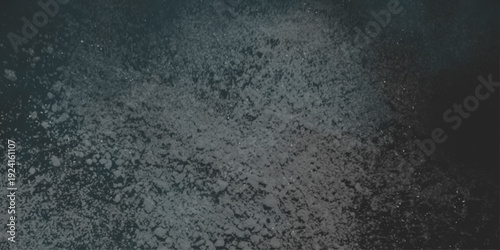 Flour spilling on black background. Abstract design of white powder cloud. Abstract wallpaper design of white color shiny snow dust powder isolated on black background .


