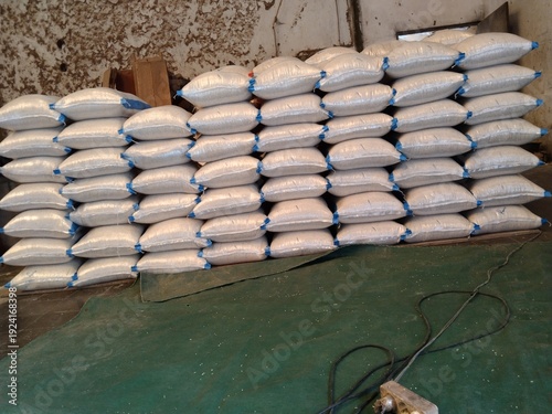 Bulk Grain Sacks Stacked in Warehouse Storage