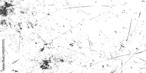 Black and white abstract texture with random scratches and speckles background grunge