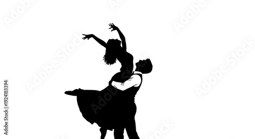 Couple dancing together in a romantic silhouette.