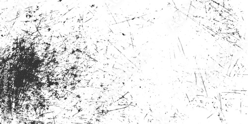 Grungy black and white textured background with random scratches and speckles grunge