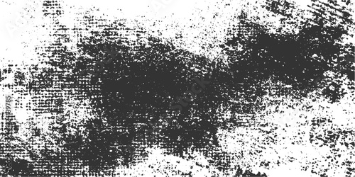 Black and white textured background with distressed fabric pattern and scattered dots abstract