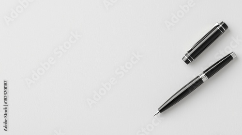 A black pen with a silver clip and nib.