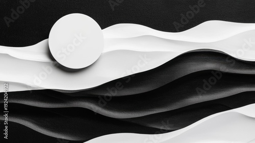 A black and white abstract design featuring a large white circle and a series of smaller white circles.