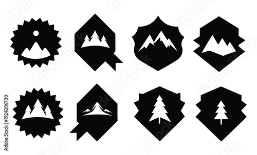 Set of abstract minimalist black silhouette icons depicting various natural landscapes, including majestic mountains and evergreen trees