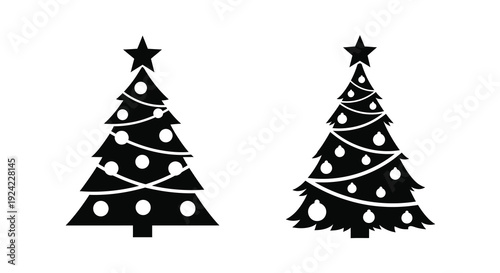 Two black christmas trees with star toppers a striking silhouette