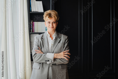 Wallpaper Mural Attractive businesswoman in a grey suit Torontodigital.ca