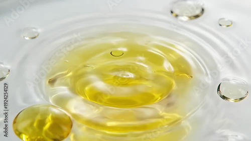 Wallpaper Mural Yellow oil drop bubble floating and merging in liquid water abstract macro Torontodigital.ca