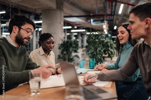 Wallpaper Mural Diverse business team collaborating during a casual meeting Torontodigital.ca