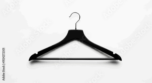 A simple black clothing hanger on a white background