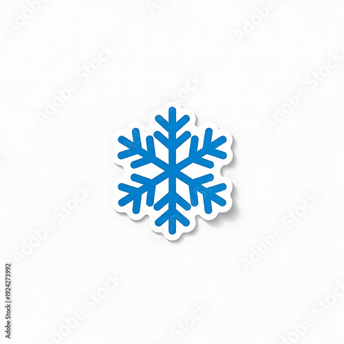 Blue snowflake sticker on white background