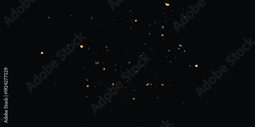 Abstract background of small, bright particles scattered across a dark, black surface
