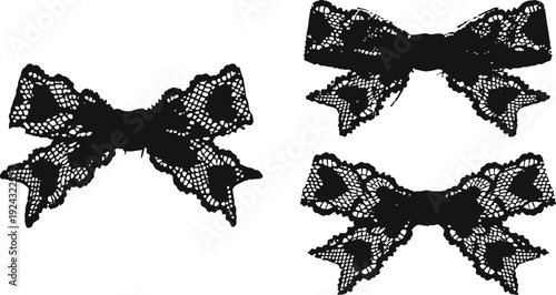 Three black lace bows with intricate patterns, vintage decorative fashion accessories