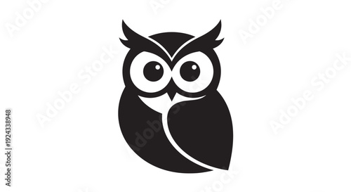 A black silhouette of an owl with large eyes
