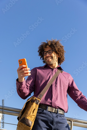  Portrait black man look down at  cell phone 