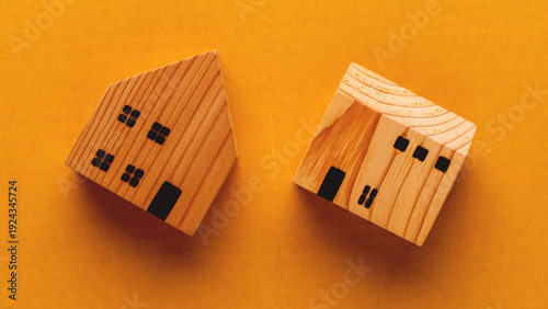 Wooden house model, concept house and real estate, brown wooden house photograph.