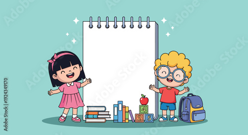 Happy children with a large blank notebook and school supplies.