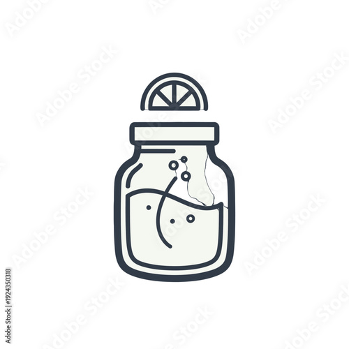 Refreshing citrus lemonade in a mason jar with slice garnish.