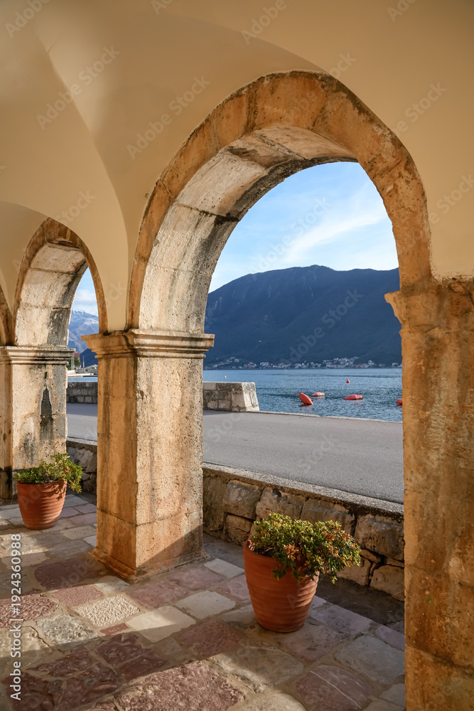 Fototapeta premium View of Sea Bay and Mountains Through Stone Arches