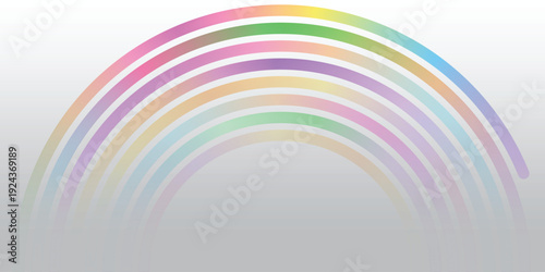 A vibrant multicolored rainbow on a gray background