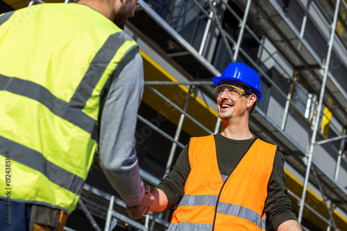 Bild auf Leinwand Civil engineers shaking hands on construction site building project