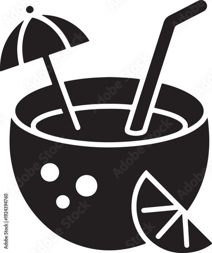 A refreshing coconut drink served with an umbrella, a straw, and a slice of lime