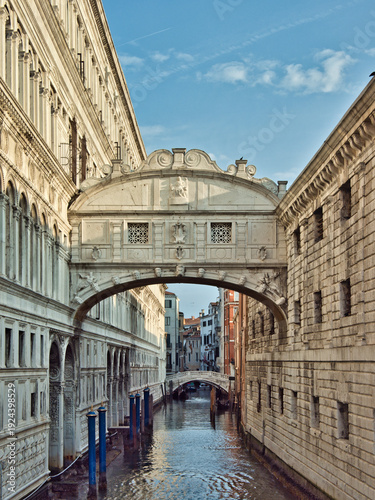 Venice Bridge of Sighs and Rio del Palazzo - The famous ornate white limestone Bridge of Sighs arching over the canal (Rio del Palazzo), connecting the Doge's Palace to the New Prisons.