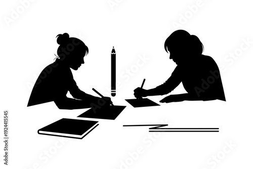 Two students silhouetted at a table, diligently writing and studying together with a large pencil