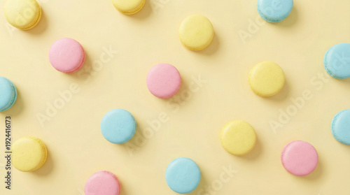 Colorful Macarons in Pink, Blue, and Yellow Arranged on a Pastel Background, Creating a Vibrant and Playful Mood
