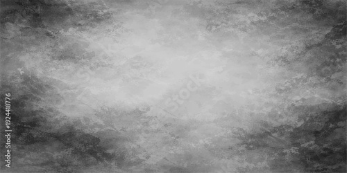 A dark grunge black and white abstract texture featuring moody smoke and mist swirling through a stormy night sky with clouds and moonlight