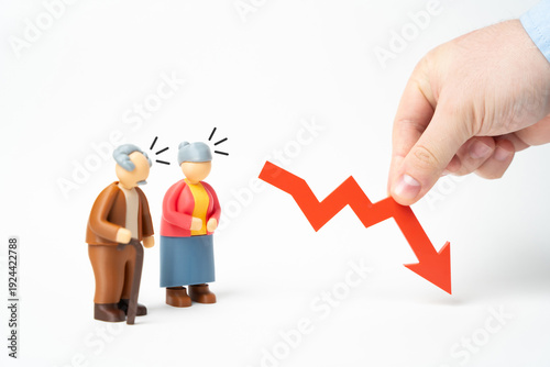 Reductions in wages and pensions for the elderly. A decline in living standards and shrinking pensioner population. Social welfare cuts and economic hardship