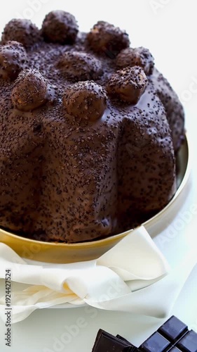 Vertical video of Profiteroles cake on white background 