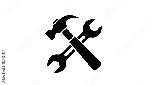 Vector illustration of black silhouette of a hammer and wrench crossed over each other on a transparent background