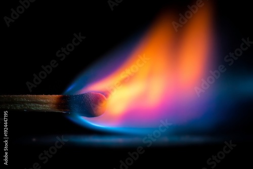 Flame From a Match Ignites in Motion Against a Dark Background, Showcasing Vibrant Colors and the Energy of Fire at the Moment of Ignition Generative AI