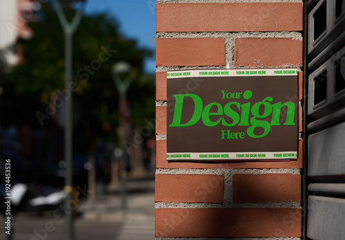 Real photo of Pink horizontal Poster on a Brick Wall in a City. PSD mockup