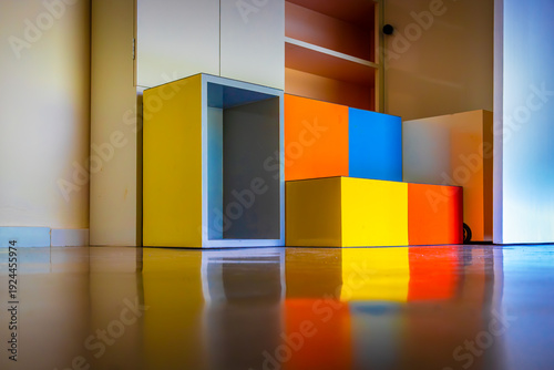 Colorful Bauhaus furniture detail inside Haus am Horn, Weimar, Germany - geometric interior design elements in a UNESCO World Heritage Bauhaus site.