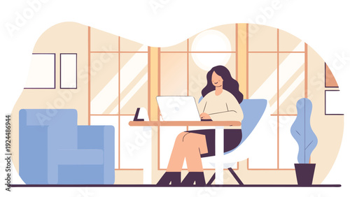 Happy businesswoman works on her laptop at a table in a bright, minimalist office with an armchair.