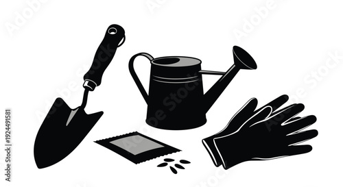 Gardening tools, seeds, and watering can arranged for planting season preparation