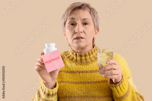 Mature woman with pills and...