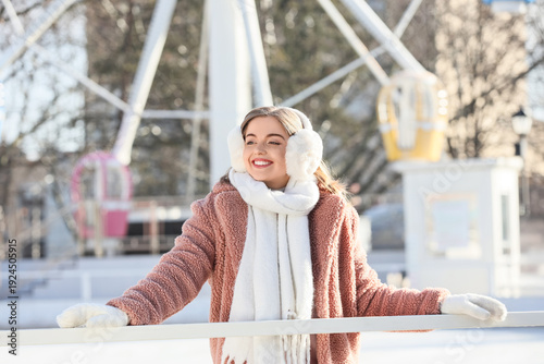 Happy young woman on skatin...