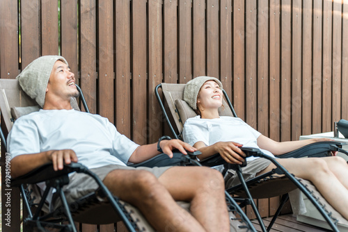 A woman relaxing in the sauna (spa, wellness, healing, refreshment, warmth, detox)