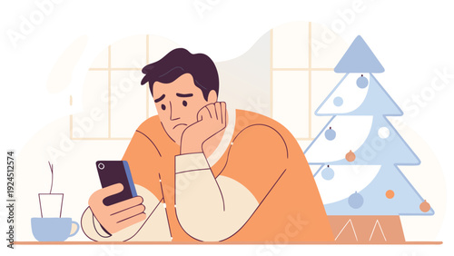 Isolated man looking at his phone with a coffee cup and Christmas tree nearby.