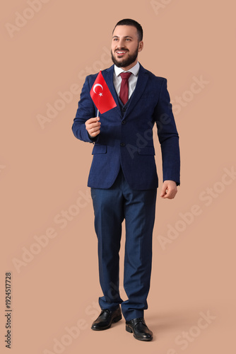 Young male businessman with...