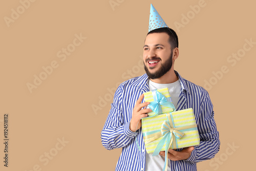 Happy young man with party ...