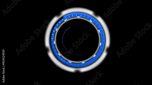 Close-up of a futuristic blue and silver circular object with a black background.