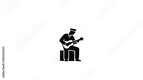 Silhouette of a Musician Playing Guitar on Stage.