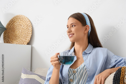 Beautiful young woman with ...