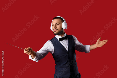 Young male conductor with h...
