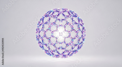 Vibrant purple and pink crystal ball chandelier hangs from ceiling with intricate geometric pattern on white background